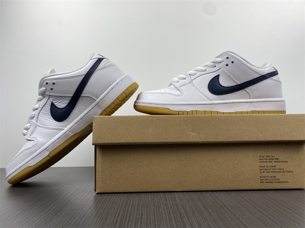 from Nike Dunk SB Low Orange Label White Navy CZ2249-100